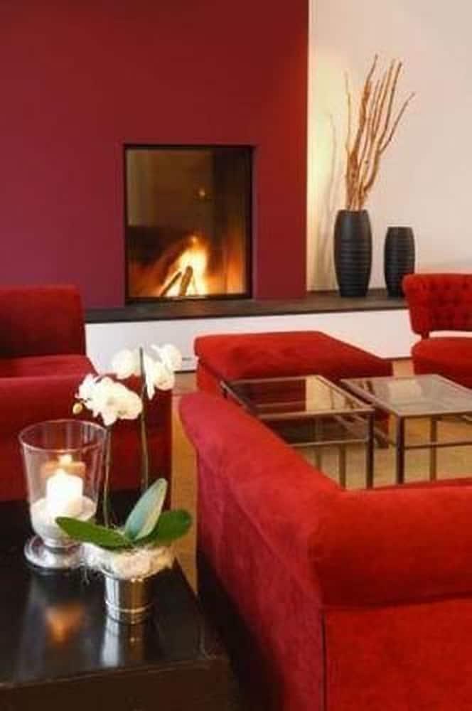 Privathotel Lindtner Amburgo Interno foto A fireplace in a home